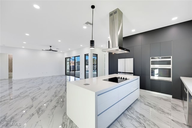 kitchen with a large island, hanging light fixtures, white fridge, black electric cooktop, and island range hood