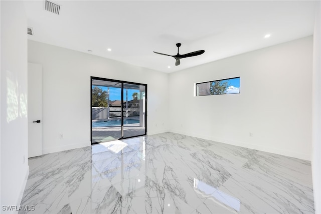 unfurnished room with ceiling fan