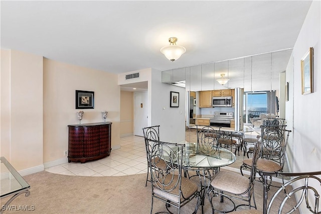 view of carpeted dining room