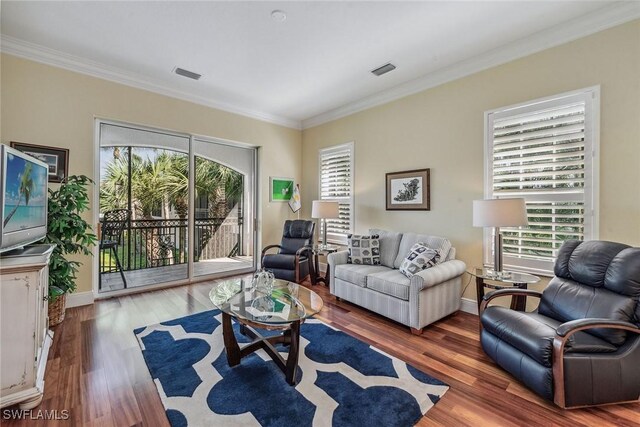 3189 Aviamar Cir Unit 202, Naples, FL 34114 - living room with healthy amount of natural light, crown molding, wood finished floors, and baseboards
