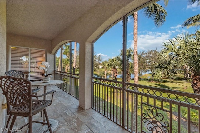 3189 Aviamar Cir Unit 202, Naples, FL 34114 - balcony with a water view