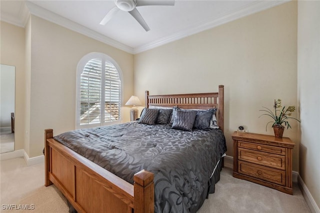 3189 Aviamar Cir Unit 202, Naples, FL 34114 - bedroom with light carpet, crown molding, baseboards, and a ceiling fan