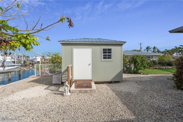 view of outdoor structure with a water view