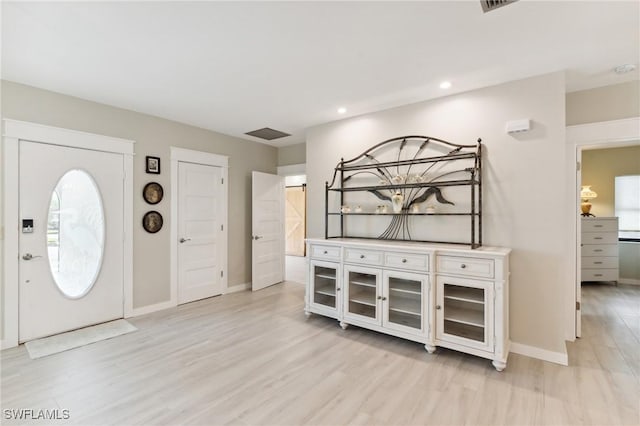 entrance foyer featuring light wood-type flooring