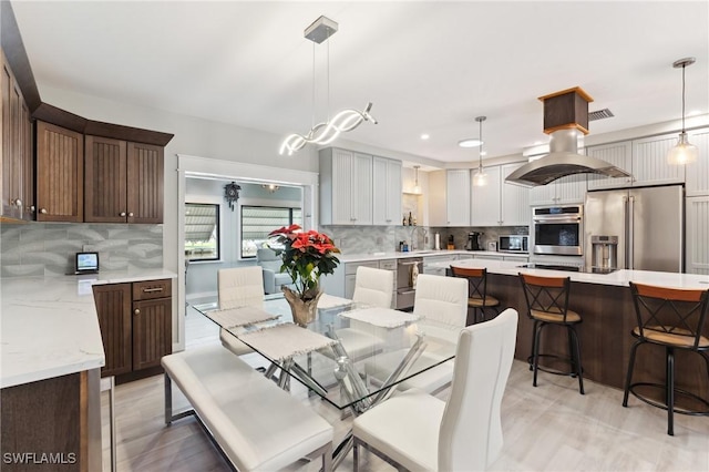 dining area featuring sink