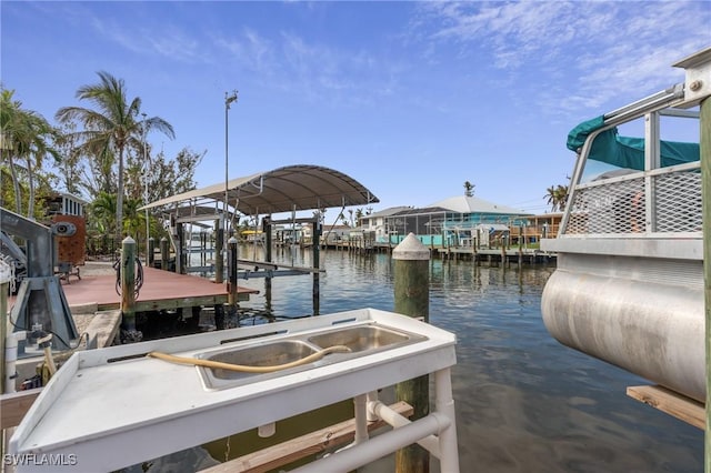 dock area with a water view