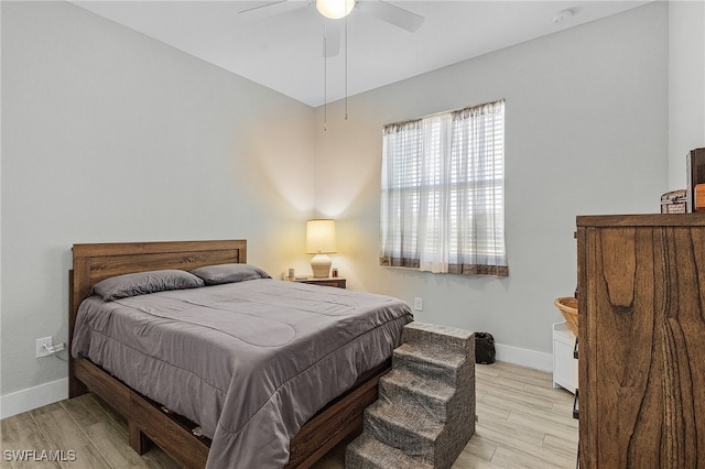 bedroom featuring ceiling fan and light wood-type flooring