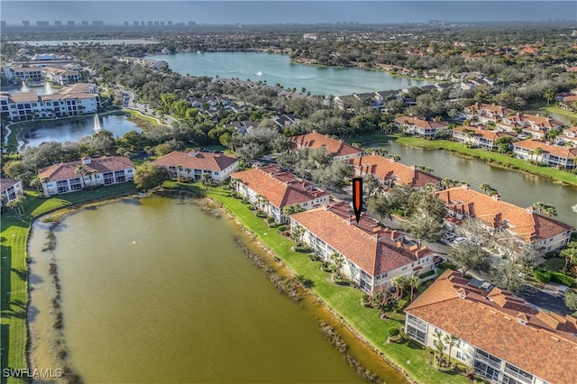 bird's eye view with a water view