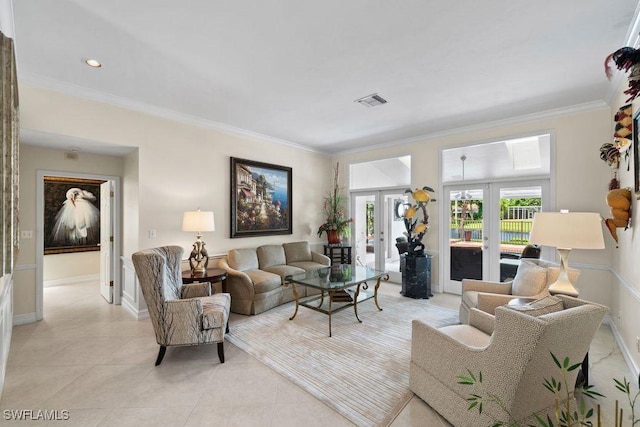 living room featuring light tile patterned floors, french doors, and crown molding