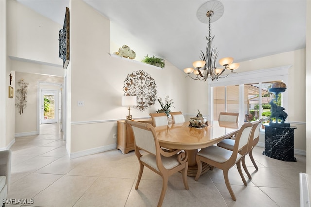 dining area featuring an inviting chandelier, light tile patterned floors, and lofted ceiling