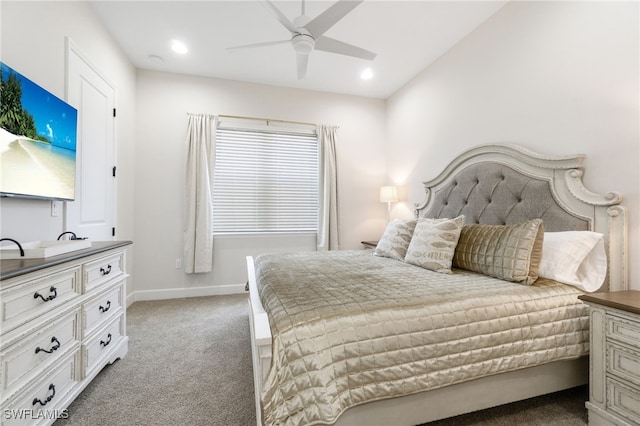 bedroom with ceiling fan and light carpet