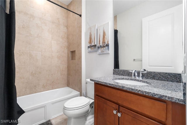 full bathroom with shower / bath combo, vanity, and toilet