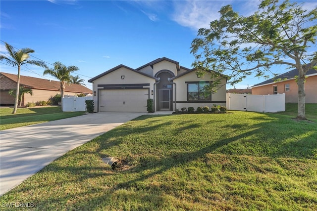 ranch-style house featuring a front yard and a garage