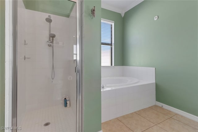 bathroom with plus walk in shower, tile patterned floors, and ornamental molding