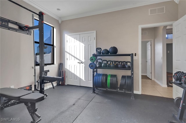 exercise room with ornamental molding