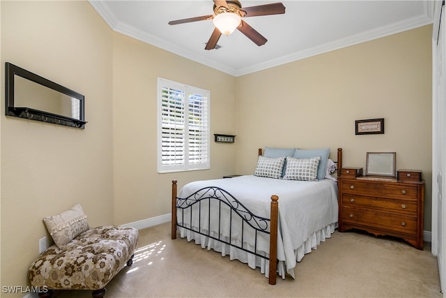 bedroom featuring ceiling fan, crown molding, and light colored carpet