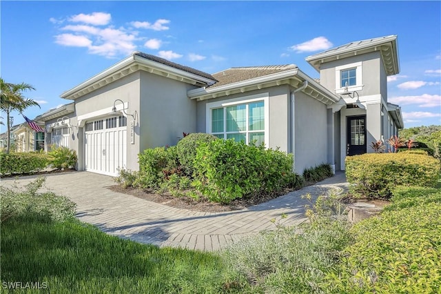 view of property exterior featuring a garage