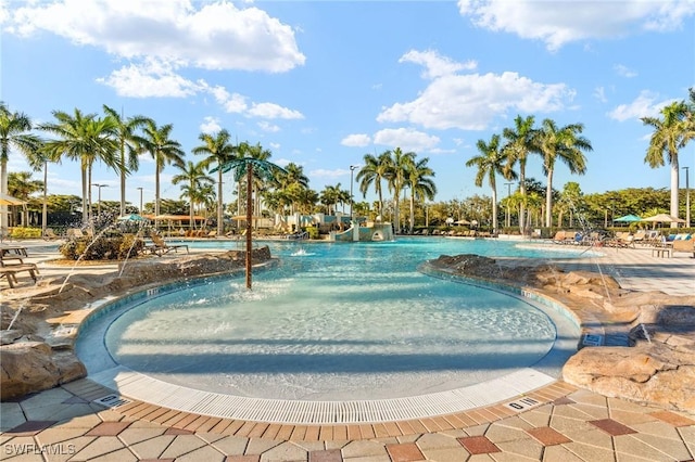 view of pool featuring pool water feature