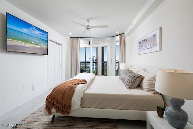 bedroom featuring access to exterior and ceiling fan