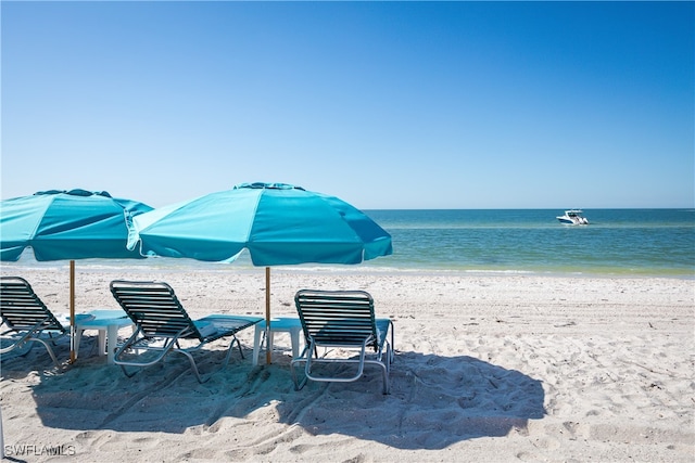 view of water feature with a beach view