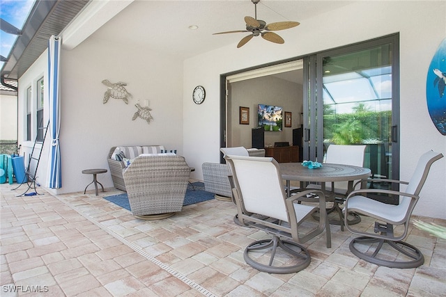 view of patio featuring ceiling fan