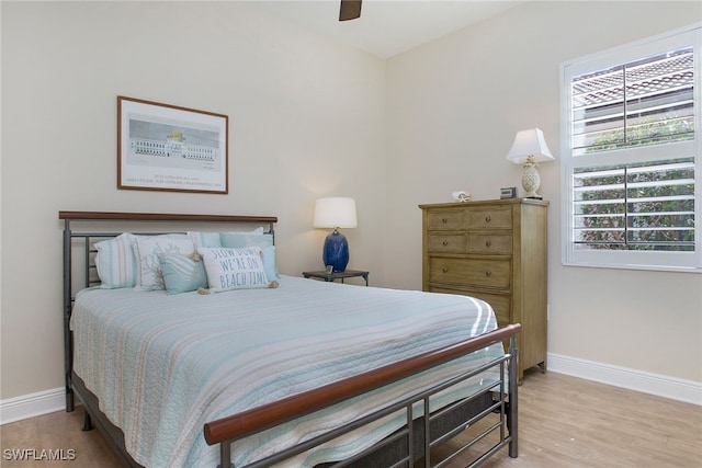 bedroom featuring ceiling fan and light hardwood / wood-style floors