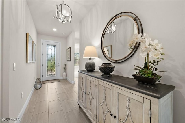 entrance foyer featuring a chandelier