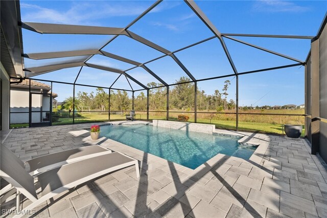 view of swimming pool featuring a patio and glass enclosure