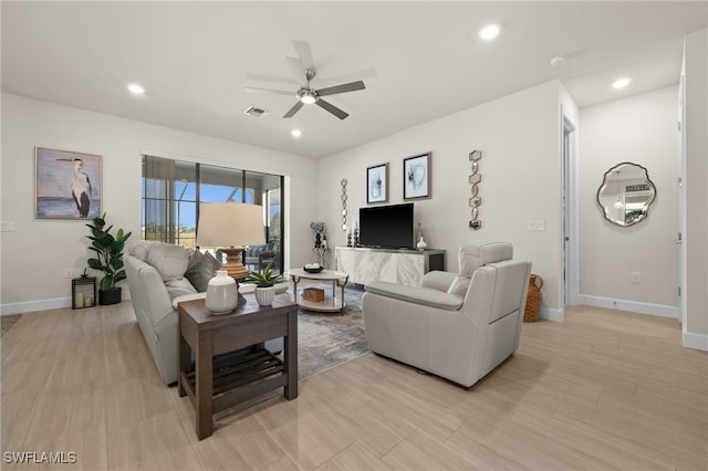 living room with ceiling fan