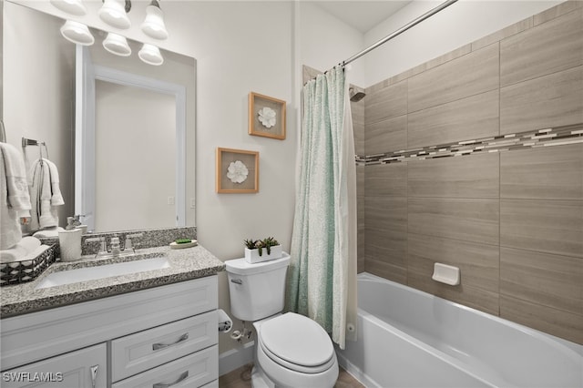 full bathroom with vanity, toilet, and shower / tub combo