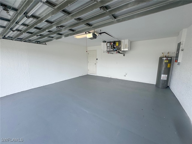 garage featuring electric panel, a garage door opener, and water heater