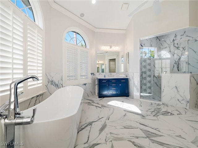 bathroom with shower with separate bathtub, vanity, tile walls, and ornamental molding