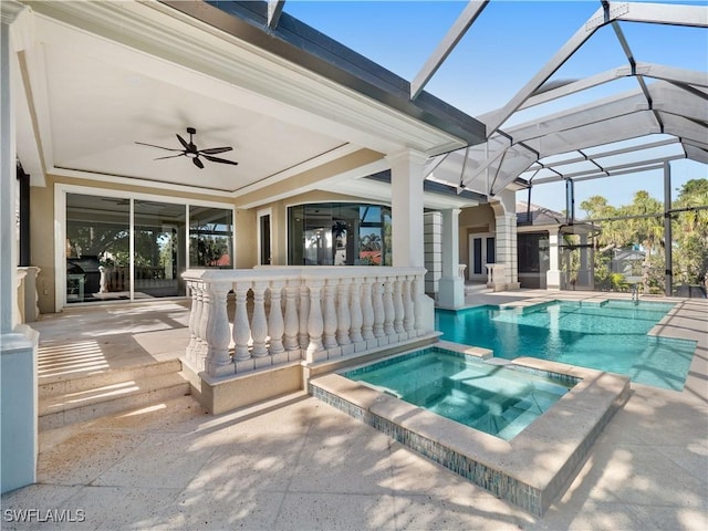 view of pool featuring a lanai, ceiling fan, a patio, and an in ground hot tub