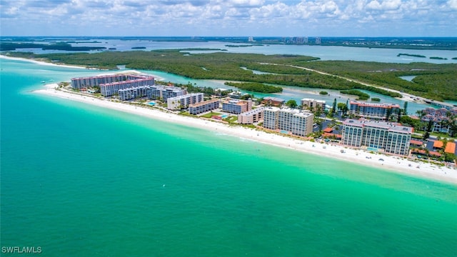 aerial view with a water view and a view of the beach