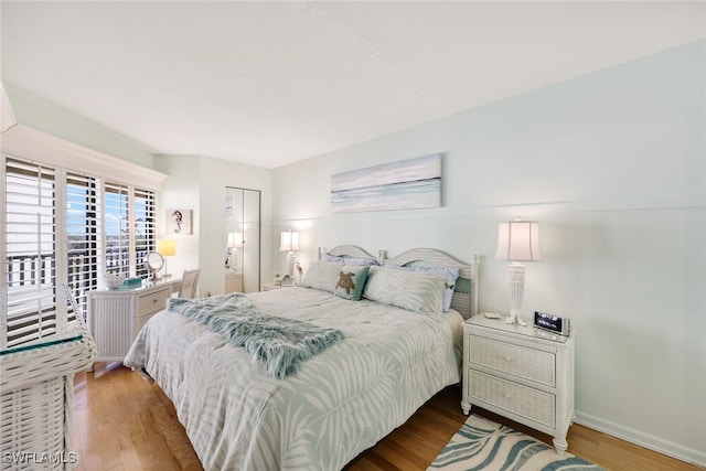 bedroom featuring hardwood / wood-style flooring