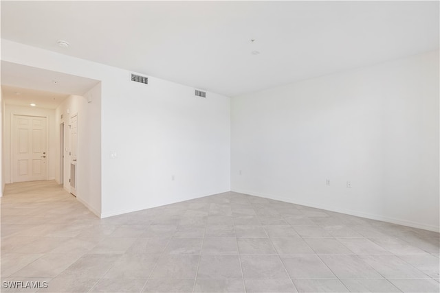 view of tiled spare room