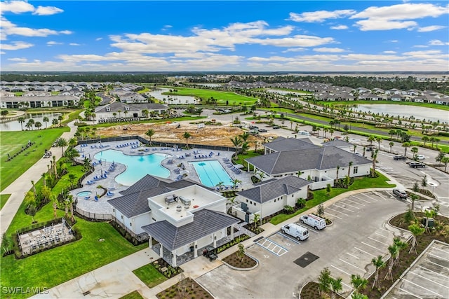 birds eye view of property featuring a water view