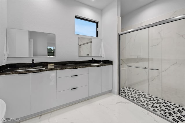 bathroom with vanity and walk in shower