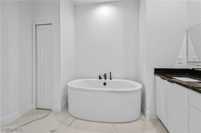 bathroom featuring a bathtub and vanity