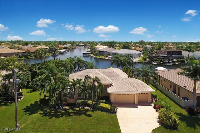 drone / aerial view with a water view