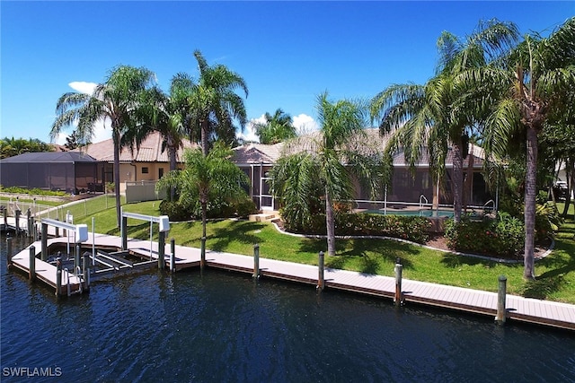 view of dock with a water view, a pool, a yard, and a lanai