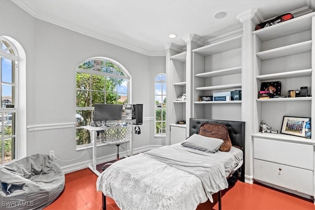 bedroom with hardwood / wood-style flooring, multiple windows, and ornamental molding