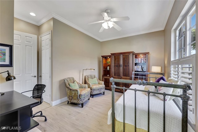 bedroom with light wood-type flooring, a closet, ceiling fan, and ornamental molding