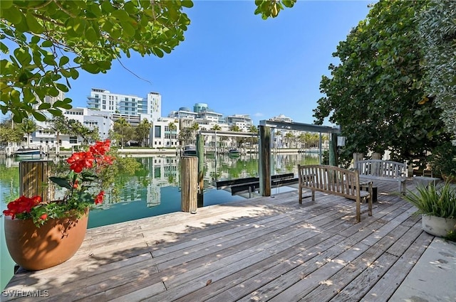 deck featuring a boat dock and a view of city