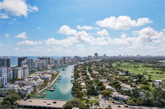 aerial view with a city view and a water view