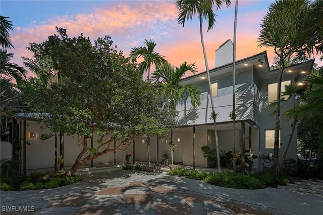 exterior space featuring stucco siding