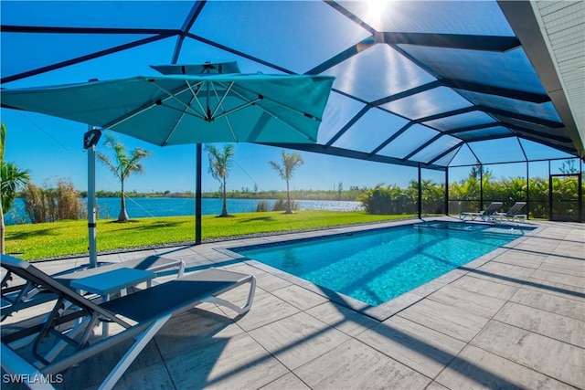 view of pool with a lanai, a patio area, a yard, and a water view