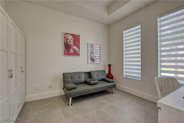 sitting room featuring light tile patterned floors