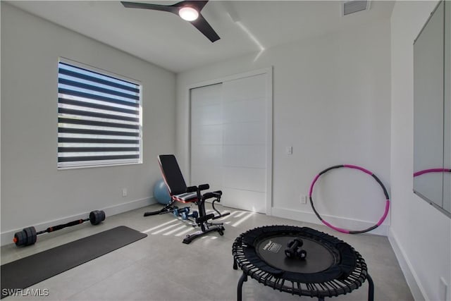 exercise room featuring ceiling fan