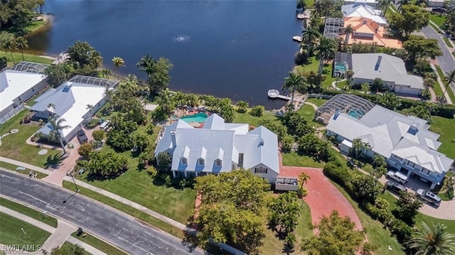 birds eye view of property featuring a water view